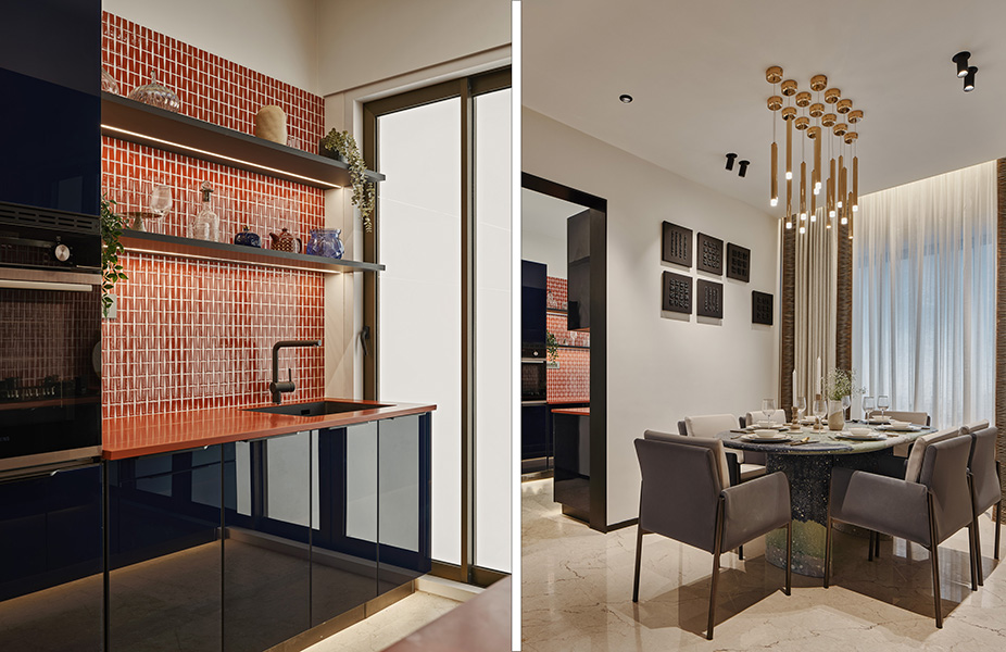 Left: The kitchen features bold hues with printed tiles and stark navy blue cabinets striking a perfect contrast. Right: The dining area with pendant lights and custom terrazzo table underscores the essence of quiet luxury. (Image Credits: Courtesy of EON) 