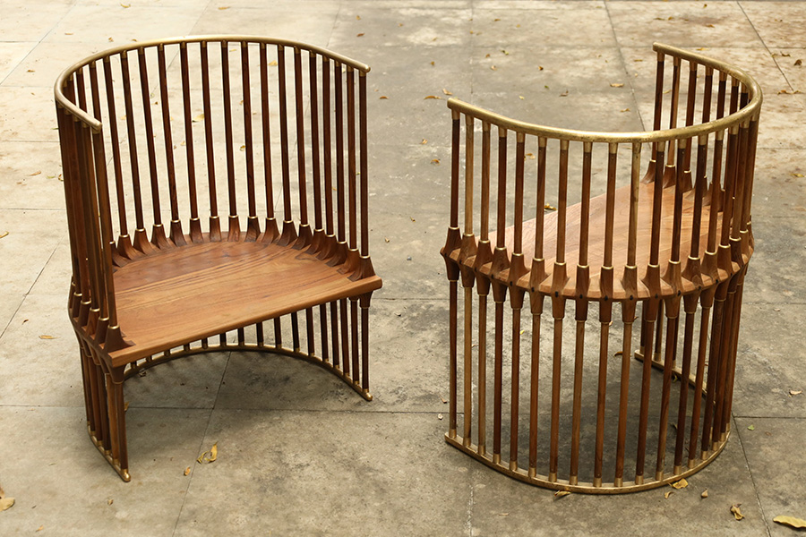 The Multi-leg Chair by SHED Studio is made of teak wood and brass. Price - ₹1,60,000 (Image credits: SHED Studio)
