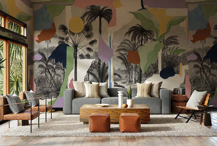 The vibrant Tres Tintas wallpaper serves as a perfect maximalist backdrop for the warm armchair and pouffes. (Image Credits: Courtesy of Tres Tintas)