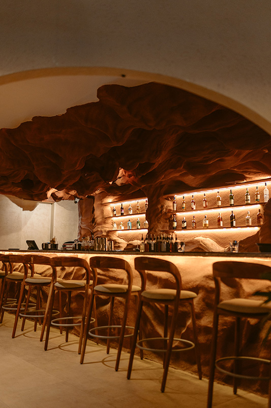 This captivating bar assembled in-house at Lumara draws inspiration from the enchanting cave structures of Cappadocia. (Image Credits: Nexmag) 