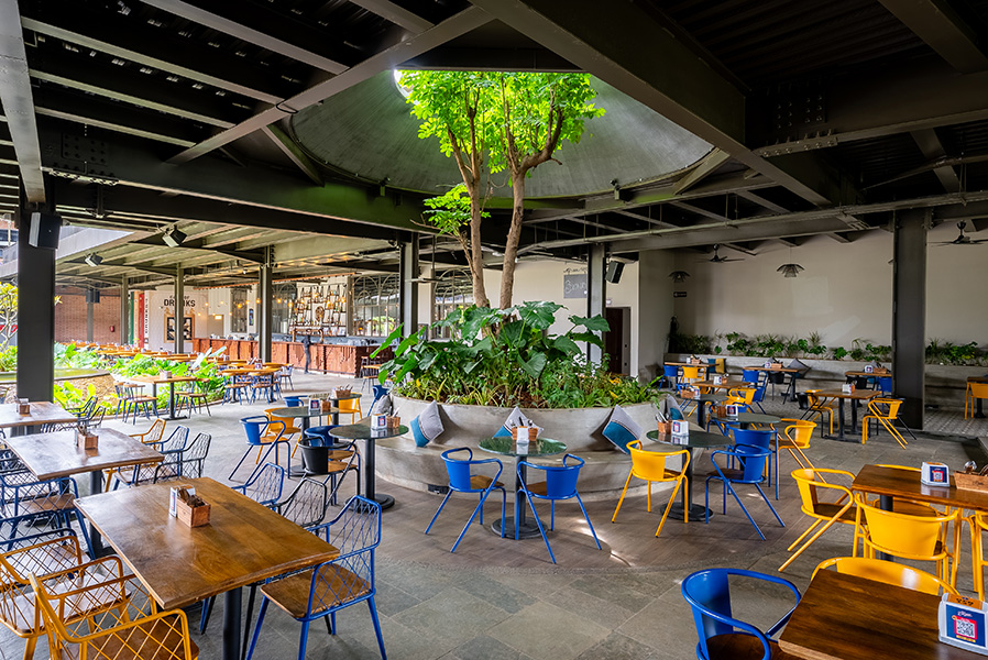 The courtyard serves as the heart of the space, connecting all the spaces of the brewery. (Image Credits: The Bier Library) 